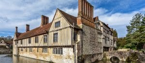 A Tudor building in a moat - Ightham Mote in Sevenoaks in Kent. For historic attractions in Kent and things to do and see in the county plus lots of events on the ultimate website full of things to do & see in Kent and what's on - www.seekent.co.uk