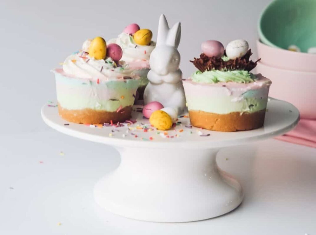 On a cake stand cakes and a rabbit figure for Easter Events 2023 - Markets, Fairs & Food in Kent