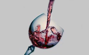 Glass being filled with red wine for VINEYARD-WINERY-TOURS-TASTINGS-IN-KENT-blog-2024VINEYARD-WINERY-TOURS-TASTINGS-IN-KENT-blog-2024-