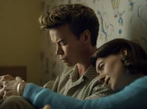 Woman with head on shoulder of a person next to them for new film releases for cinemas in Kent and On Swift Horses from Sony Pictures