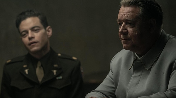 Two men sitting next to each other one in khaki uniform for new film releases in Kent and Nuremberg from Sony Pictures Classic