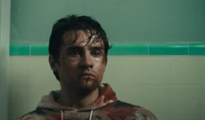 Man with a battered bloody face for the New Film Releases in Kent Guide - Obsession, May 2026