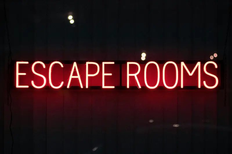 Lit sign saying Escape Rooms for Escape Rooms in Kent